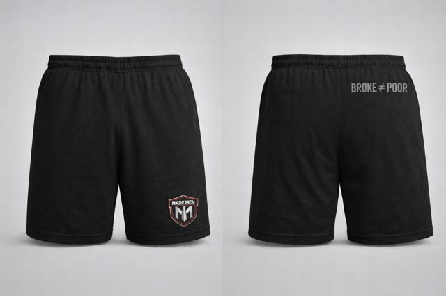 Black training shorts with shield logo and 'Broke ≠ Poor' rear print.